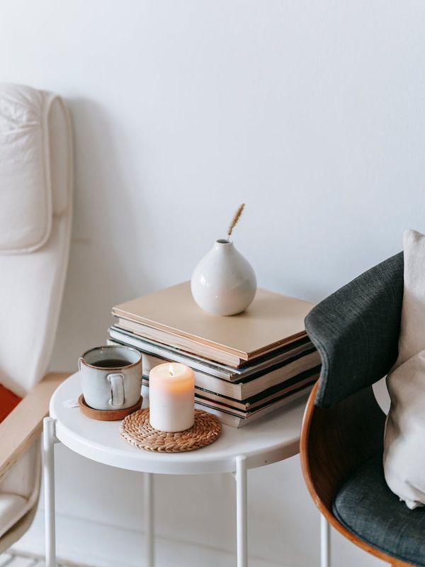 Minimalist composition with a yoga mat and natural elements.